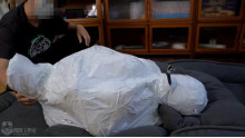 呼吸制御と口腔内虐待のMummification
